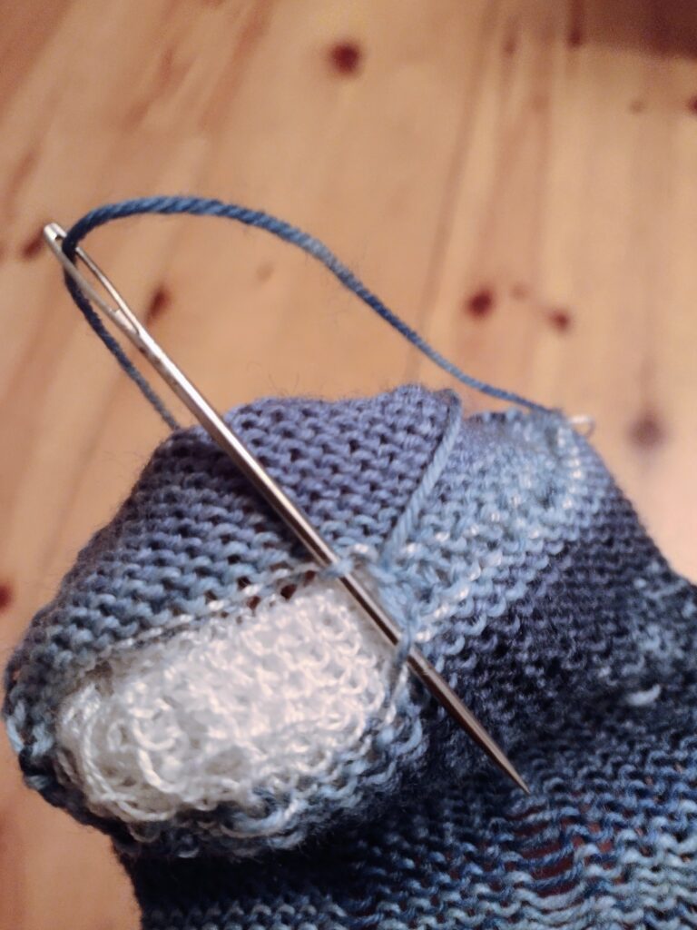 Darning a custom wool sock